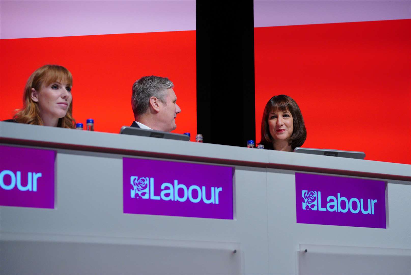 Deputy Labour leader Angela Rayner with Sir Keir Starmer and shadow chancellor Rachel Reeves on stage at the party’s conference (Peter Byrne/PA)