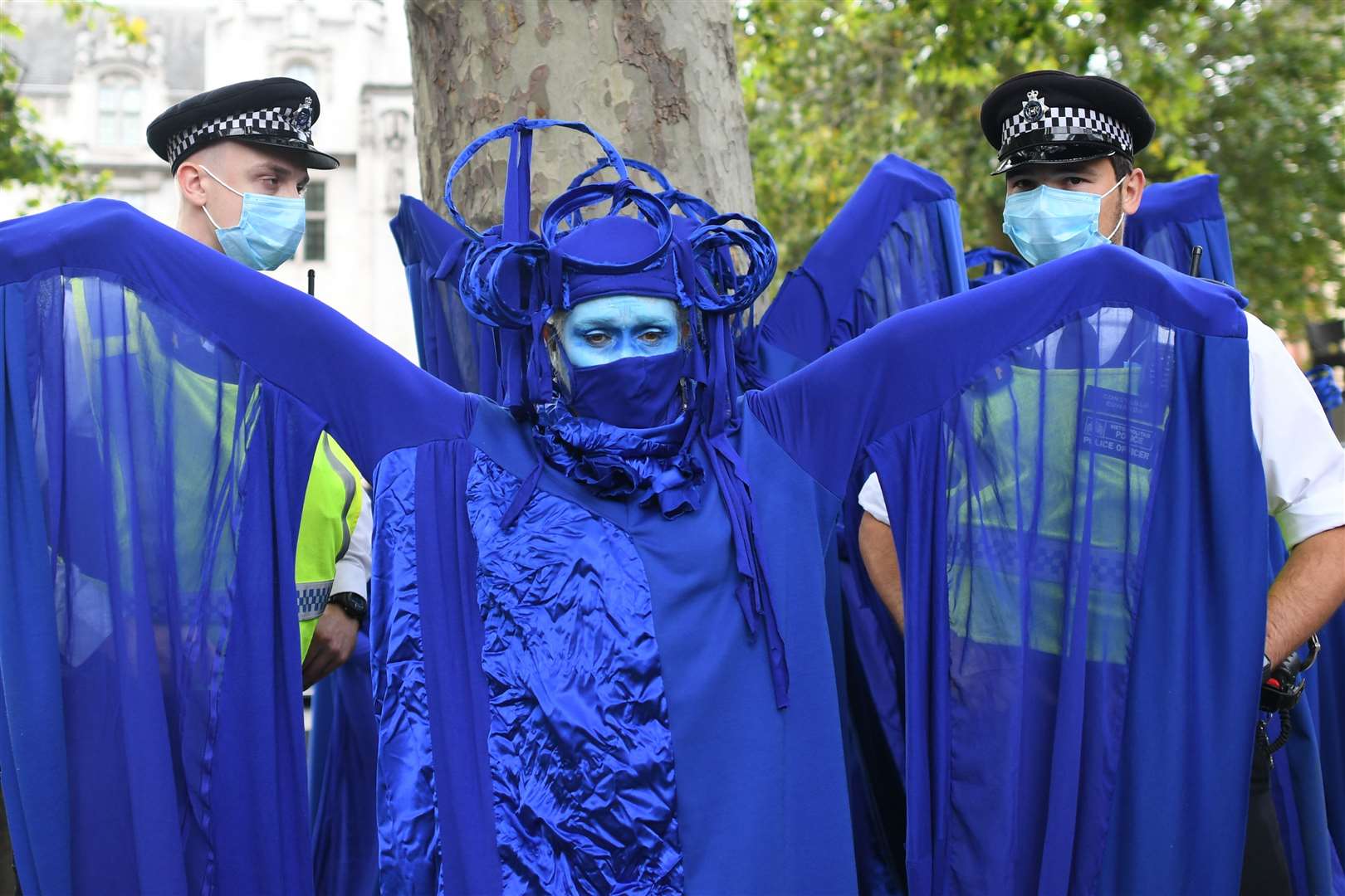 The dancers wore blue gowns to represent the sea (Stefan Rousseau/PA)