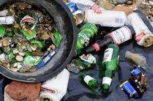 The bucket full of broken glass and rubbish picked up from the shingle at the beach at Minster Leas