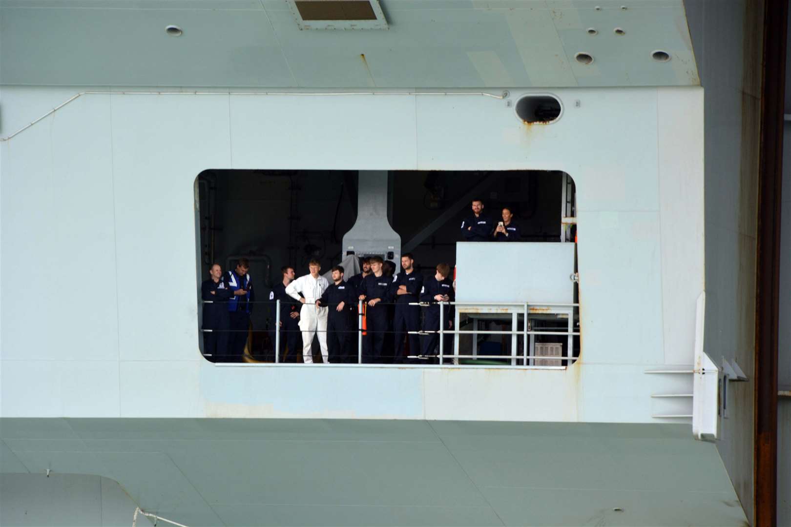 The crew of the HMS Prince of Wales as it sails into Portsmouth (Ben MItchell/PA)