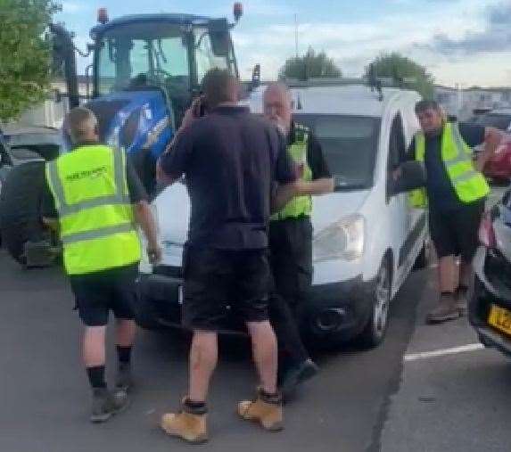 Security staff blocking ice cream man Salih Kadi's route through the car park at Seaview Holiday Park in Swalecliffe, Whitstable