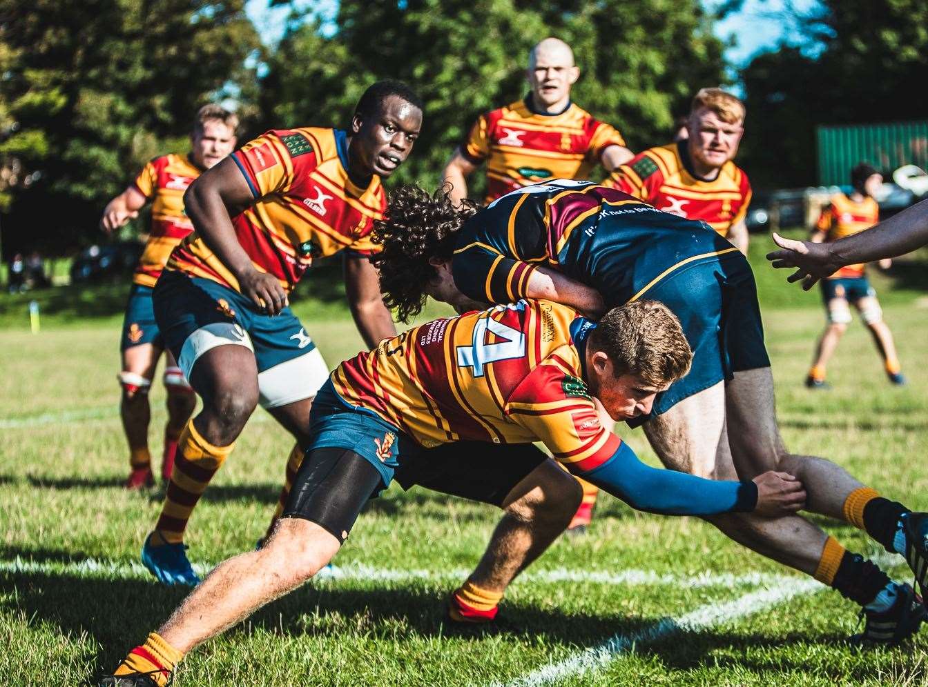 Medway's Mikey Grice locks horns with Old Colfeians. Picture: Jake Miles Sports Photography