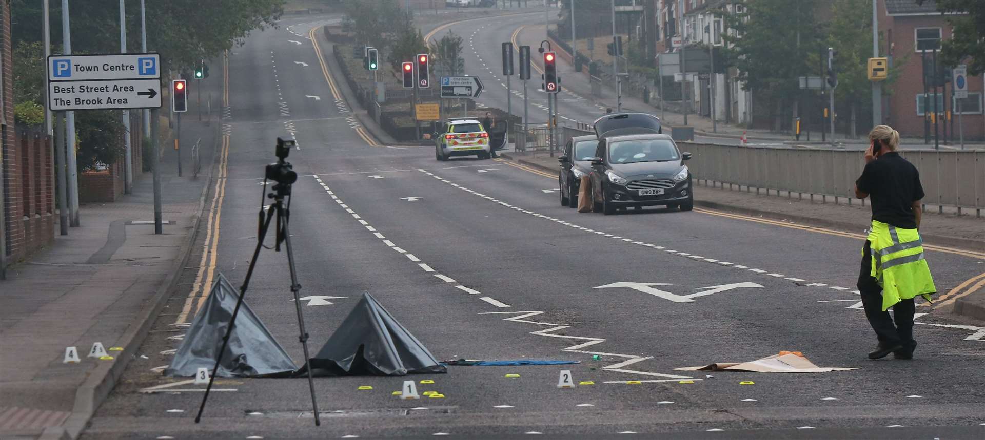 Police at the scene of a crash in New Road, Chatham. Images: UKNiP