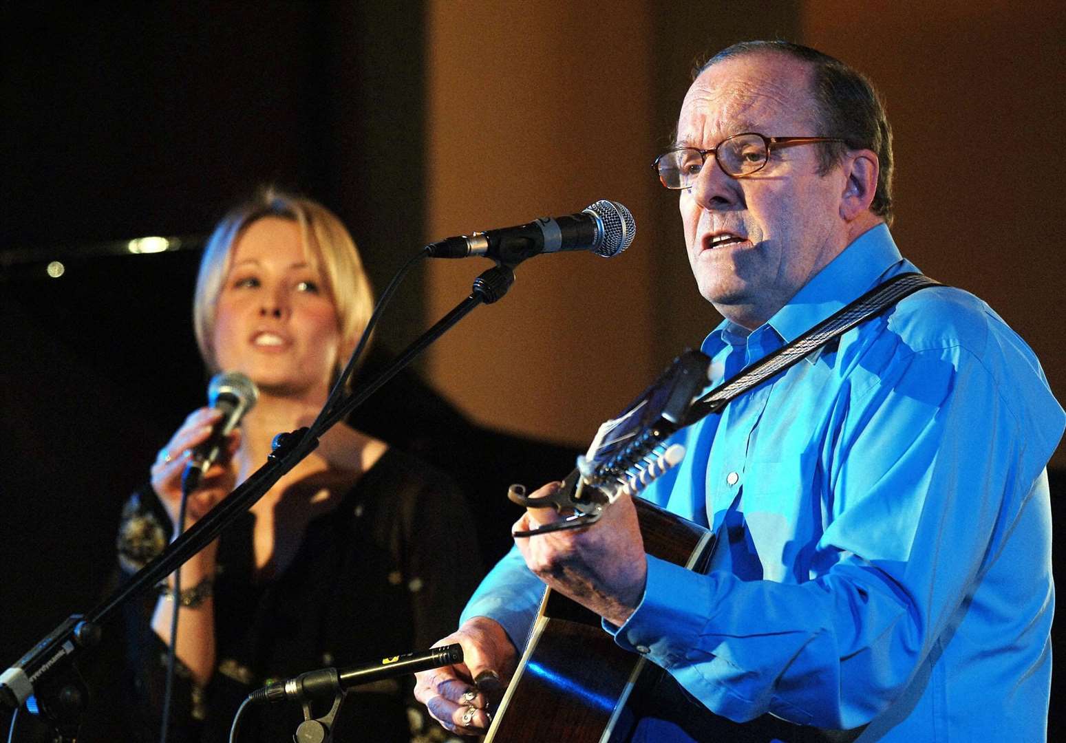 Michael Ancram singing a folk song with his daughter Clare (John Stillwell/PA)