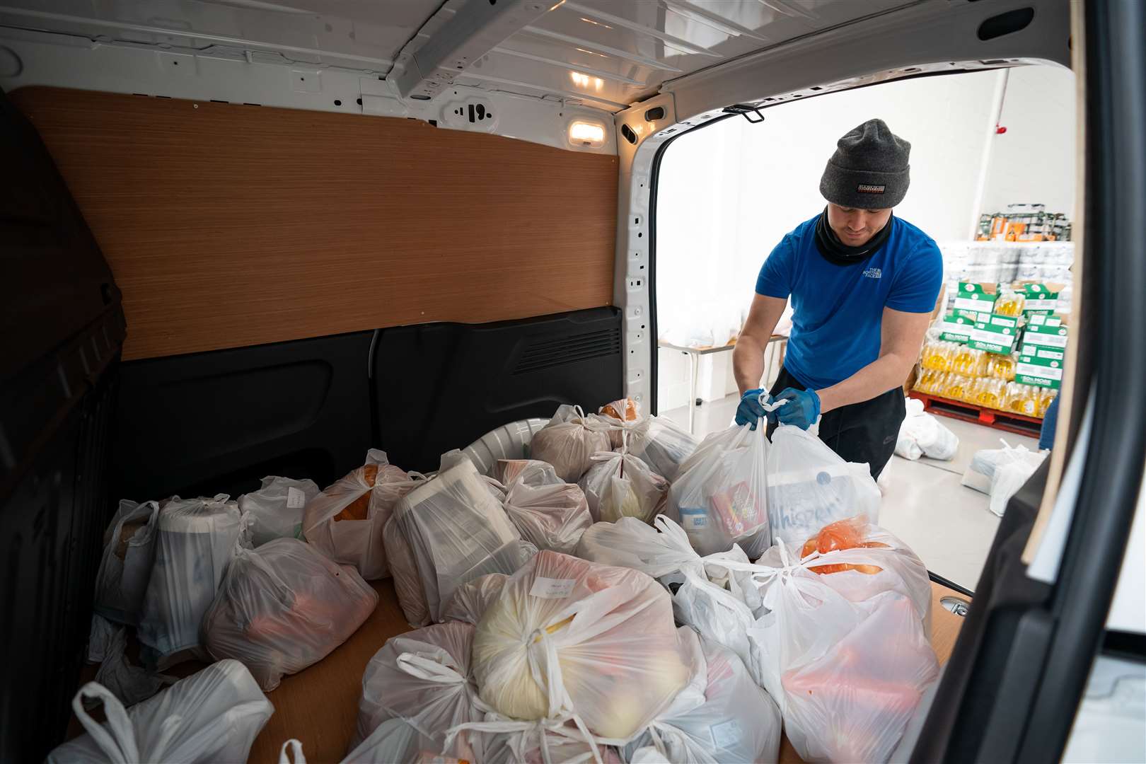 In many cases the food was donated, packed and delivered by an army of volunteers, working round the clock to help others in their time of need (Aaron Chown/PA)