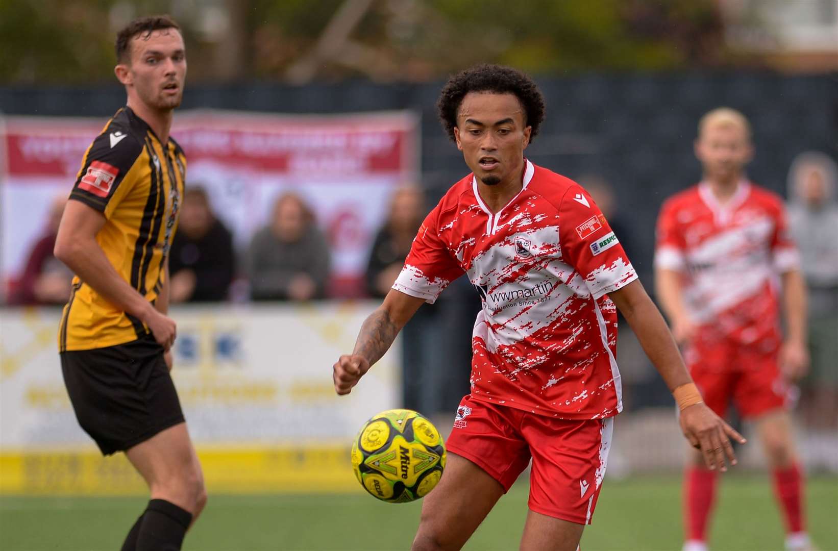 TJ Jadama turning away from Folkestone forward Dan Smith for Ramsgate in the Rams’ 3-1 FA Cup first qualifying round victory on Saturday. Picture: Stuart Watson