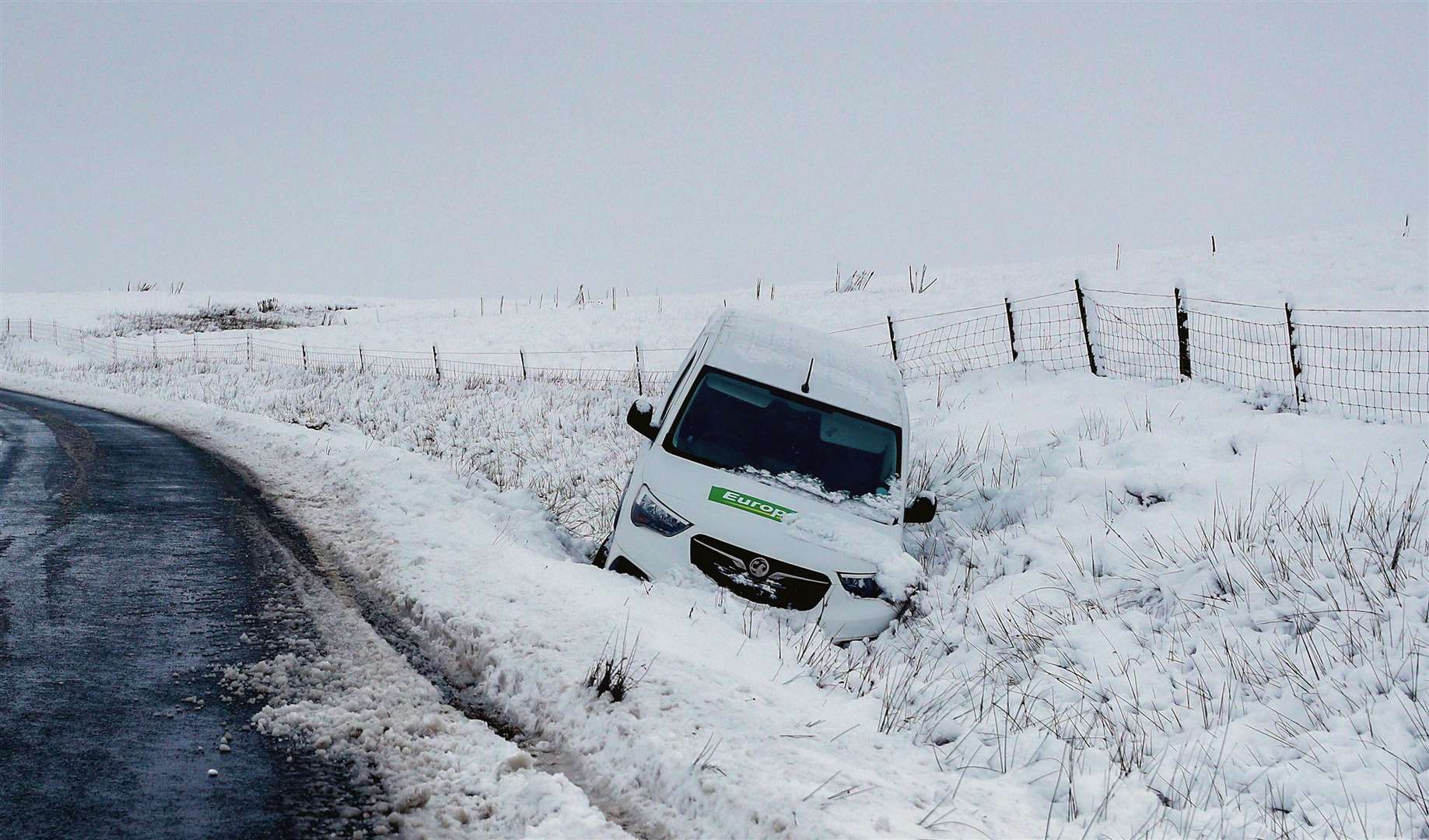 A van was stranded in North Yorkshire as the weather brought travel disruption and perilous driving conditions (Peter Byrne/PA)