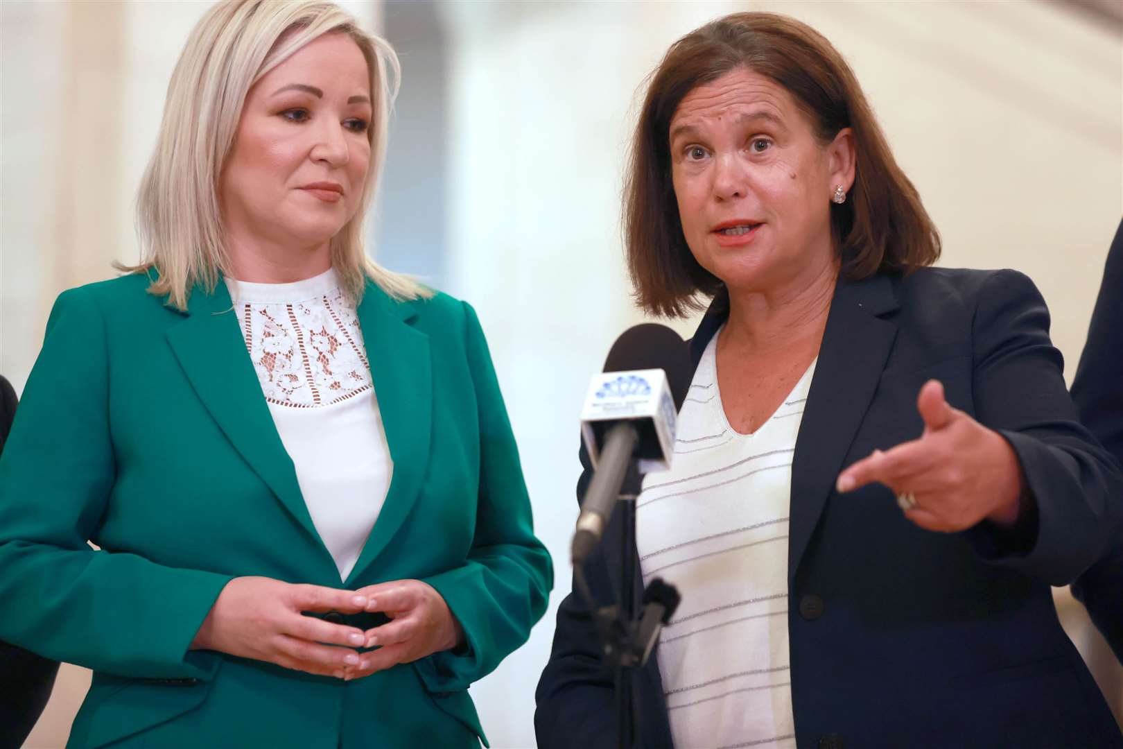 First Minister of Northern Ireland Michelle O’Neill, left, and Sinn Fein’s president Mary Lou McDonald address the media in the Great Hall of Parliament Buildings (Liam McBurney/PA)