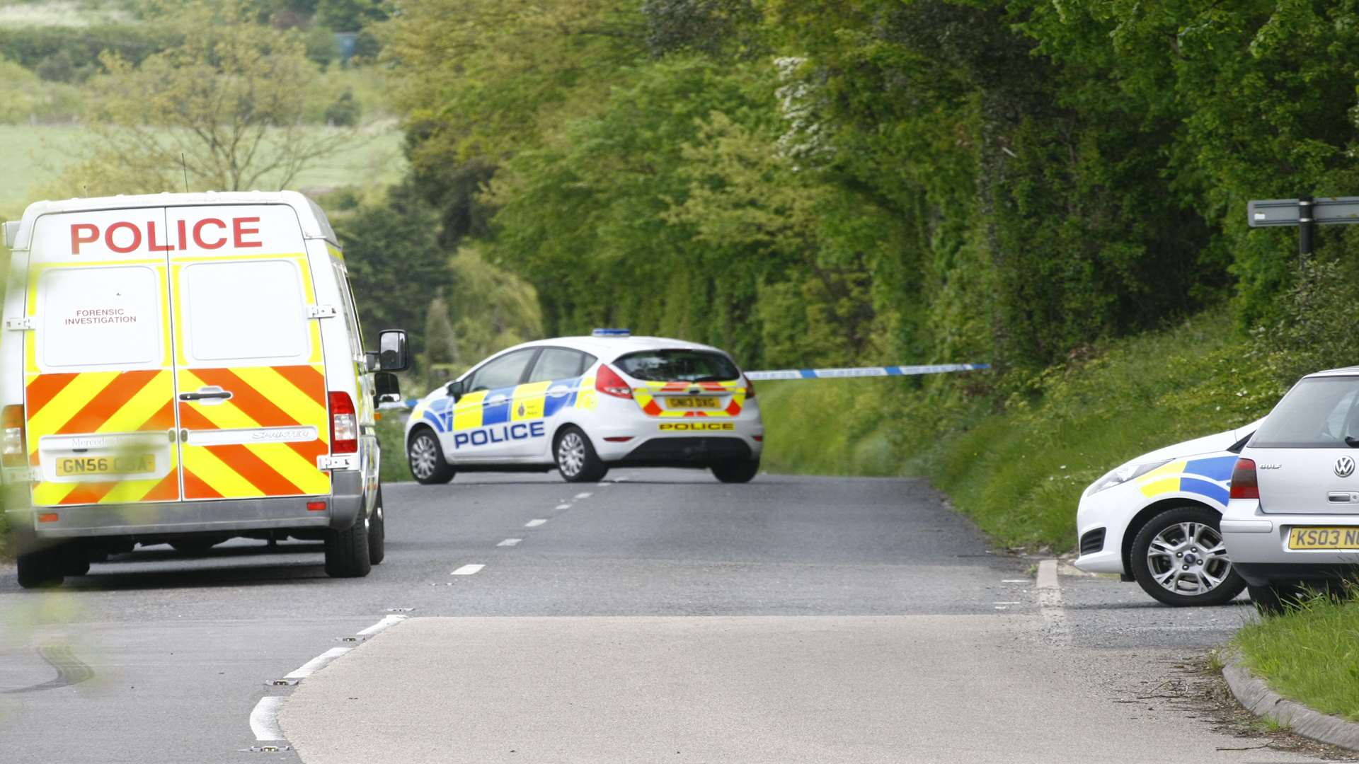 Police in the area where Mariola (Mika) Cudworth's body was found