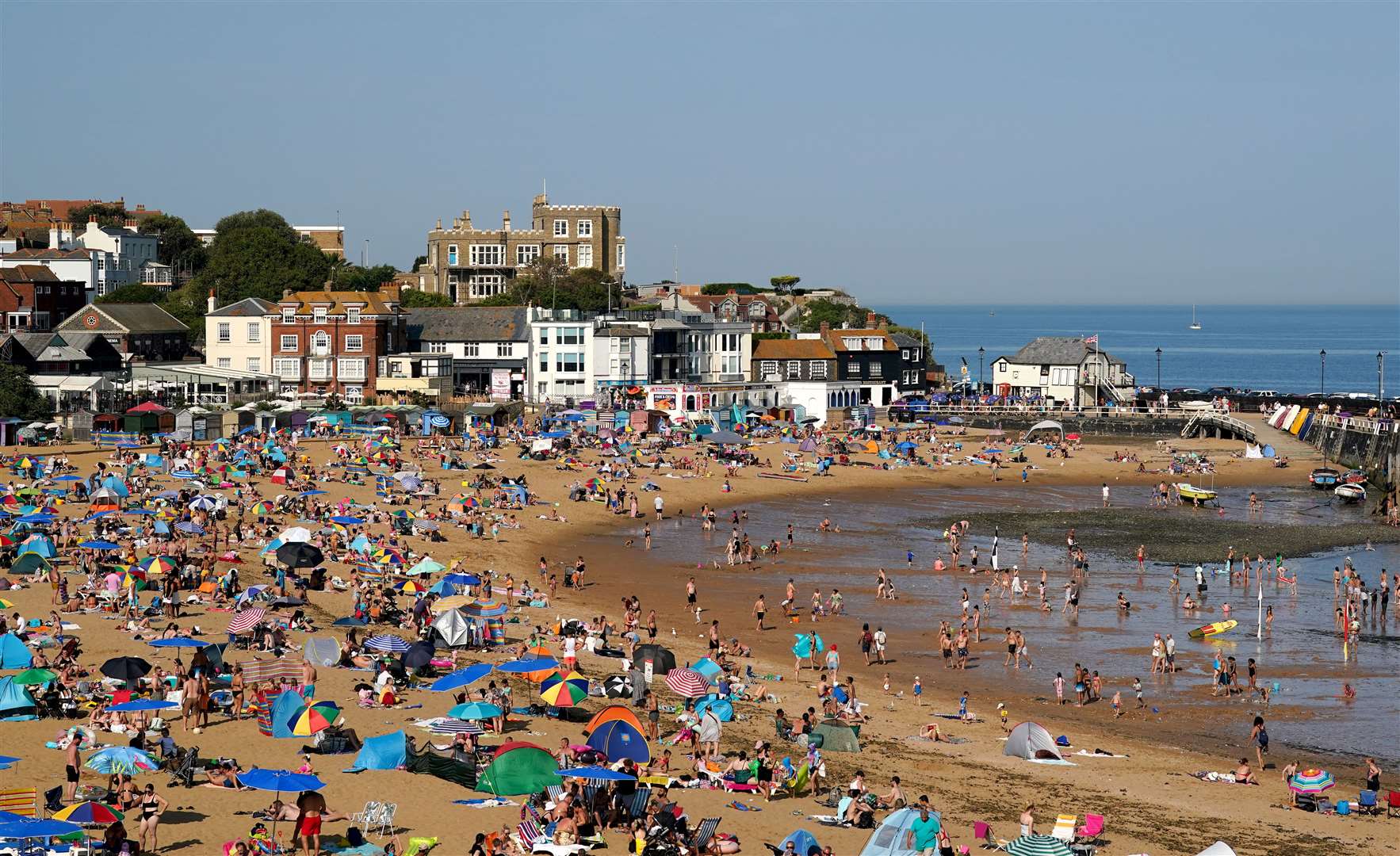 Unexpected hot weather in September led people to delay spending on autumn clothing (Gareth Fuller/PA)