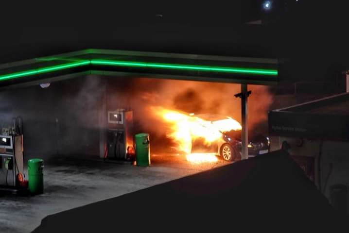 A car engulfed in flames at the BP garage. Picture: Ashley Judd