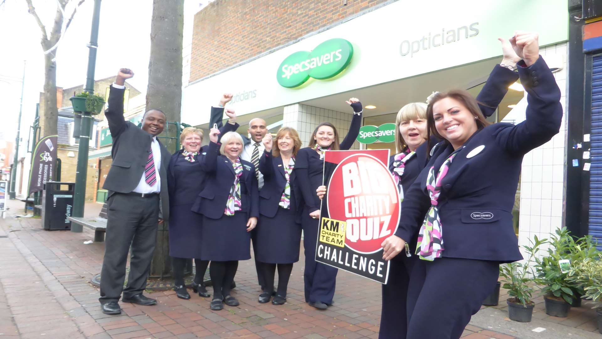 Chatham director Oluwatoyin Fayefunmi (far left) and staff announce Specsavers is supporting the 10th anniversary KM Medway Big Quiz.