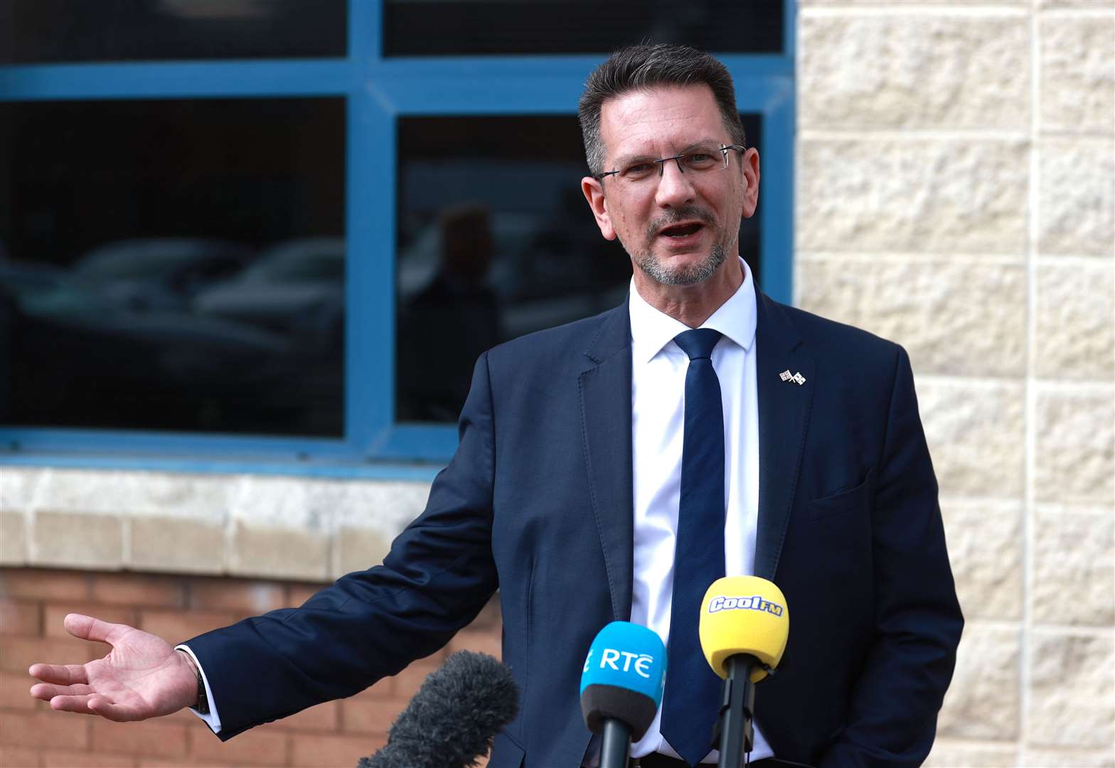 Northern Ireland minister Steve Baker speaking to the media at Ionic Technologies in Belfast (Liam McBurney/PA)