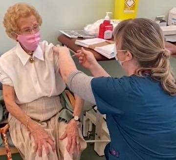 Rene Petts, 101, getting her first Pfizer jab in Herne Bay on December 15