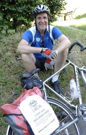 John Peet takes a rest after completing his sponsored charity ride. Picture: Terry Scott