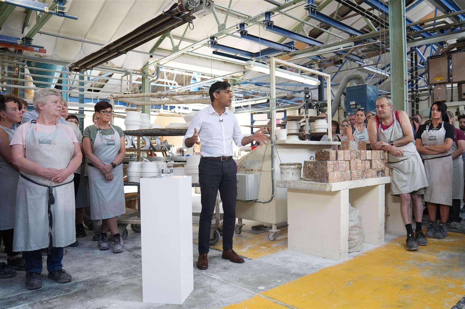 Prime Minister Rishi Sunak took questions from staff during his visit to the Denby Pottery plant (Joe Giddens/PA)