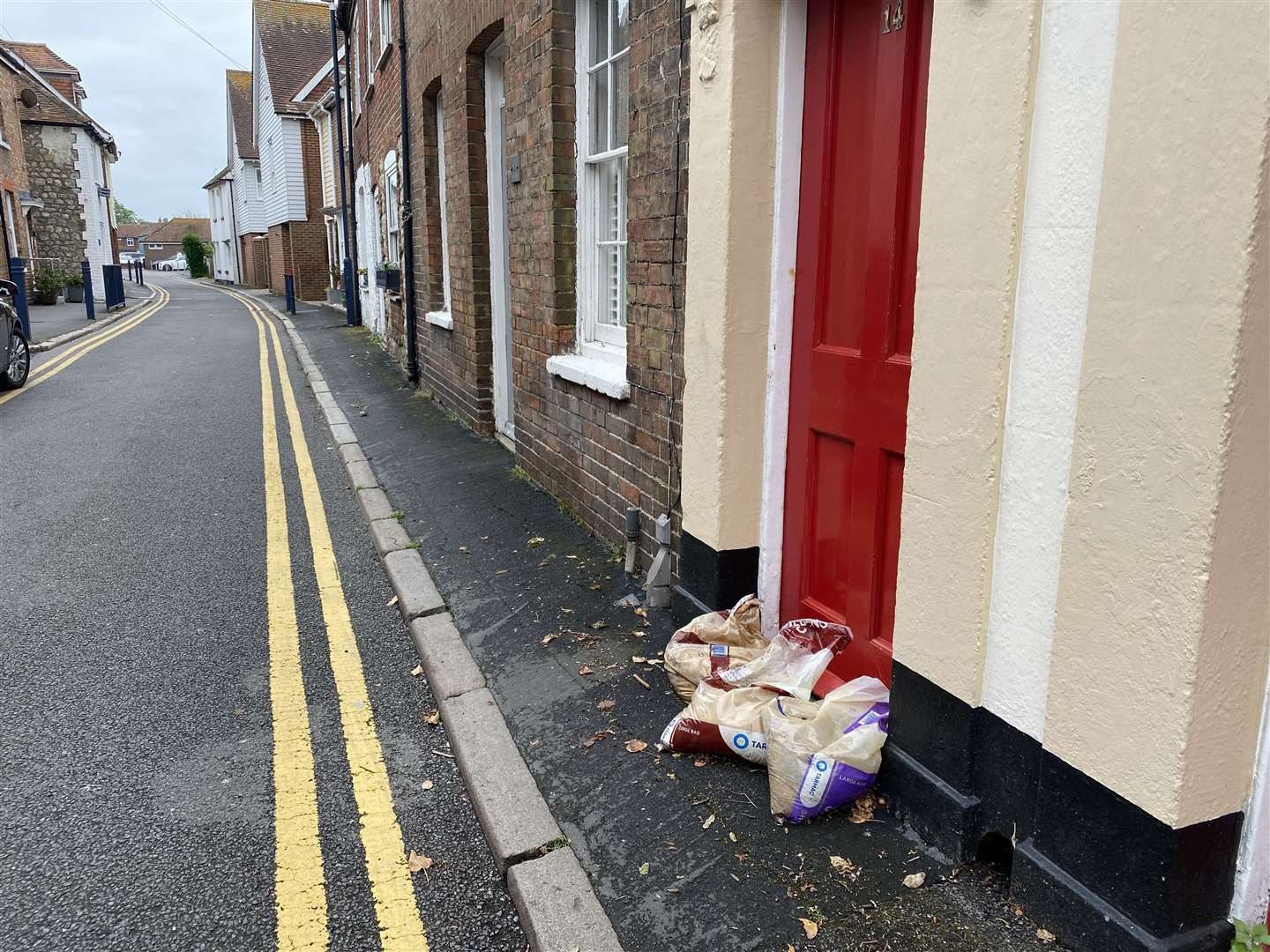 There are towels and sandbags outside homes in Chapel Street, which were affected by the flooding