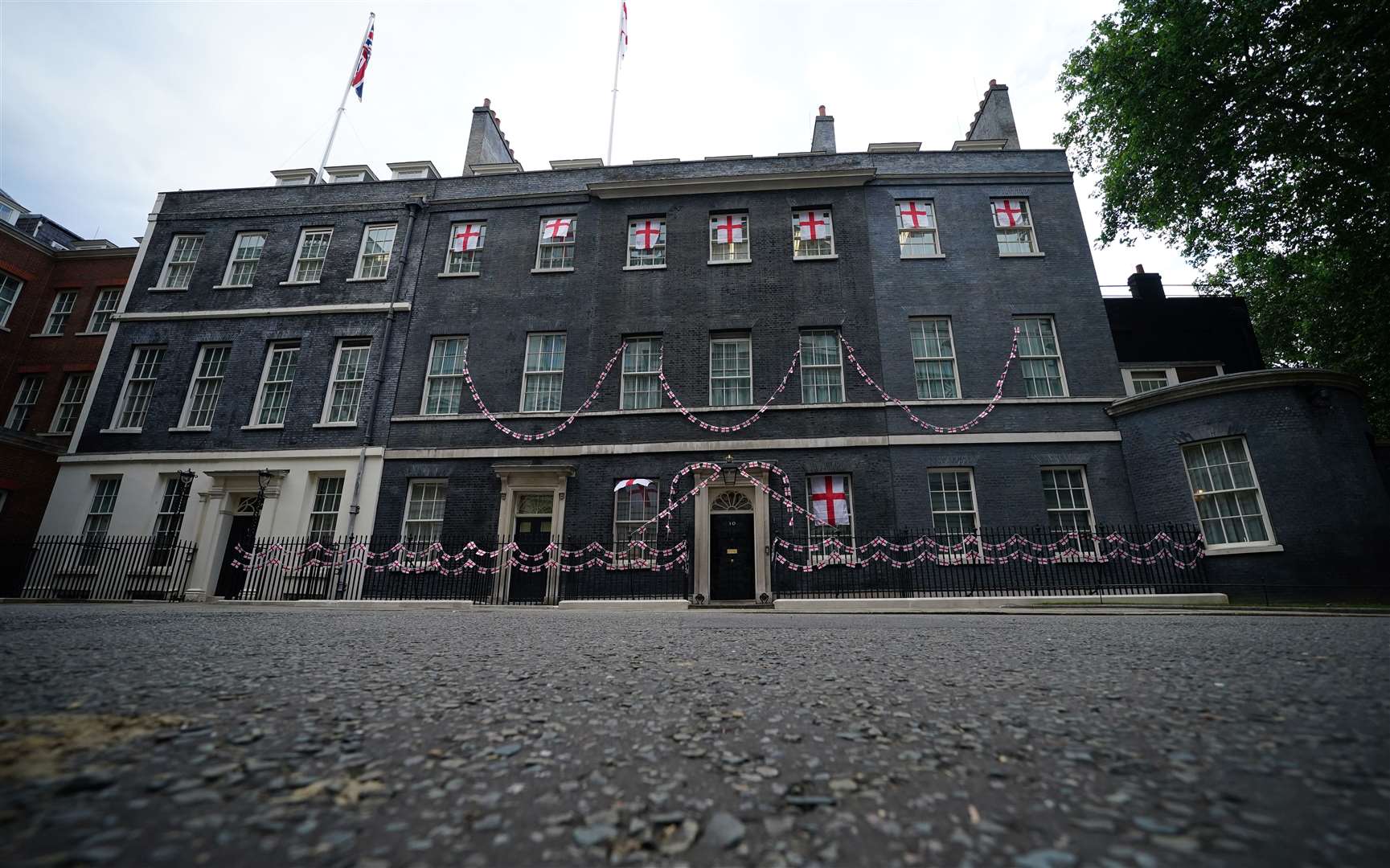 10 Downing Street, the Official residence of the Prime Minister of the United Kingdom, decked out in St George’s flags (PA)