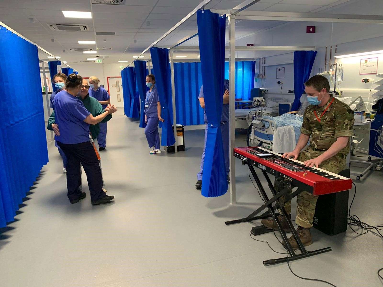 Dancing on the ward at Exeter to music provided by the Royal Marines Band (Royal Navy/PA)