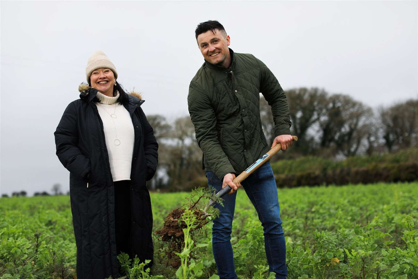 Grainne Wafer, Guinness global brand director, alongside farmer Walter Furlong (Julien Behal/PA)