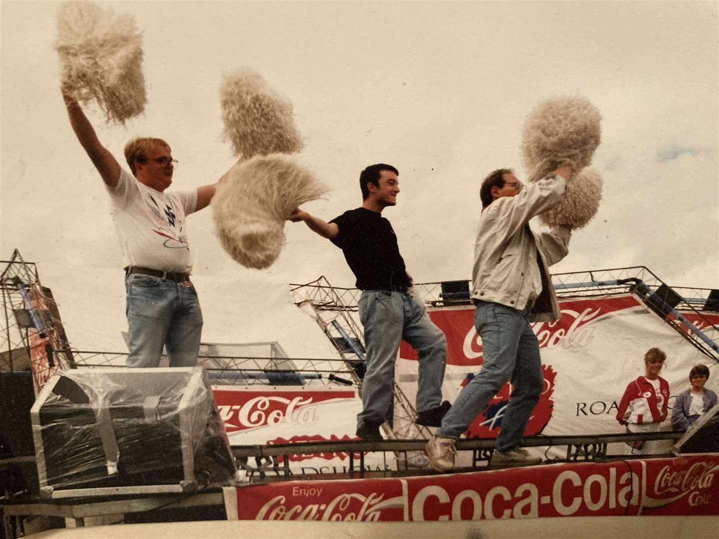 Motormouth on the road: John Nurden, right, tries warming up the crowd with his pom-poms before losing his sense of smell