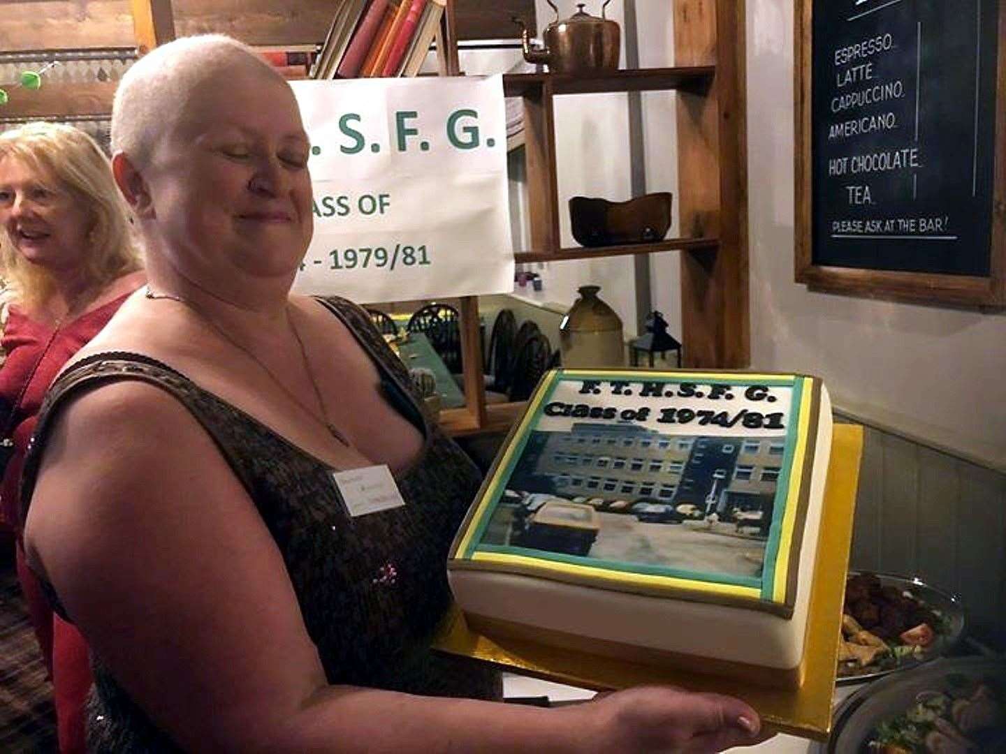 Amanda Richie with the cake specially made for the school reunion she helped organise