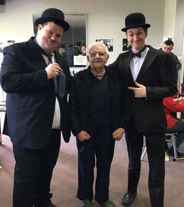 Super fan Ken Wallin at a Laurel and Hardy convention with impersonators