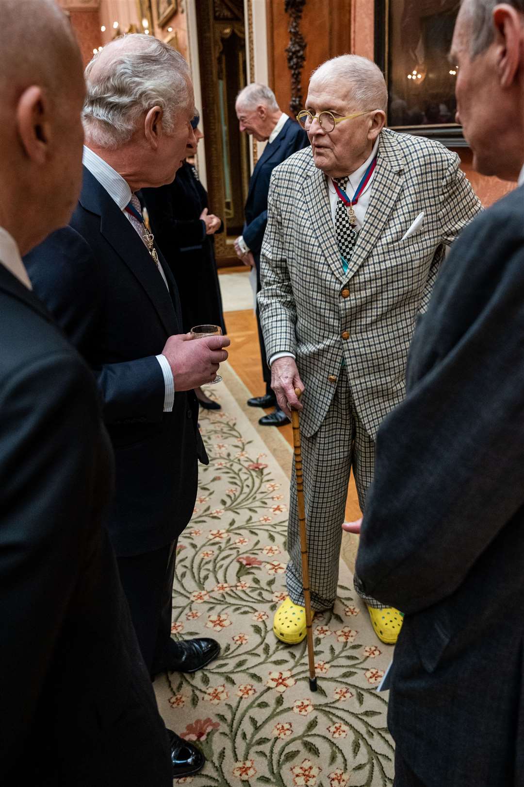 Charles chats with artist David Hockney during the Order of Merit reception (Aaron Chown/PA)