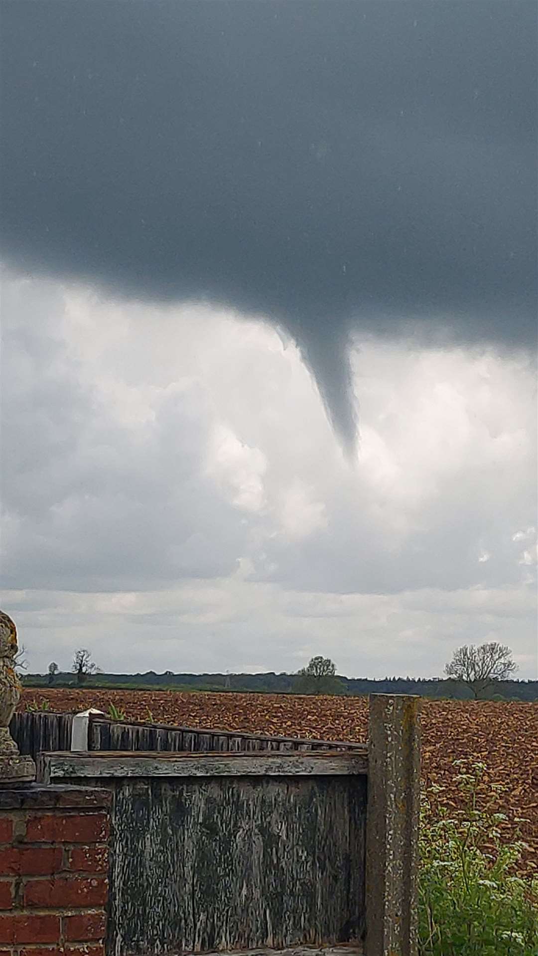 A funnel cloud over Grantham, Lincolnshire, on Wednesday (@loki_weather/Twitter/PA)