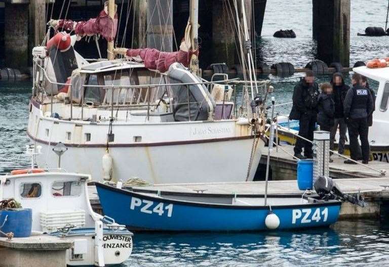 Police board yacht at Newylyn Harbour, Cornwall. Picture: Greg Martin (19088505)