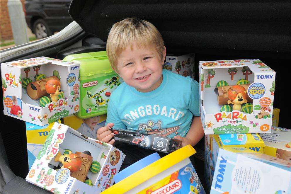 Aaron Lindridge with the toys to give to the Royal Marsden Hospital