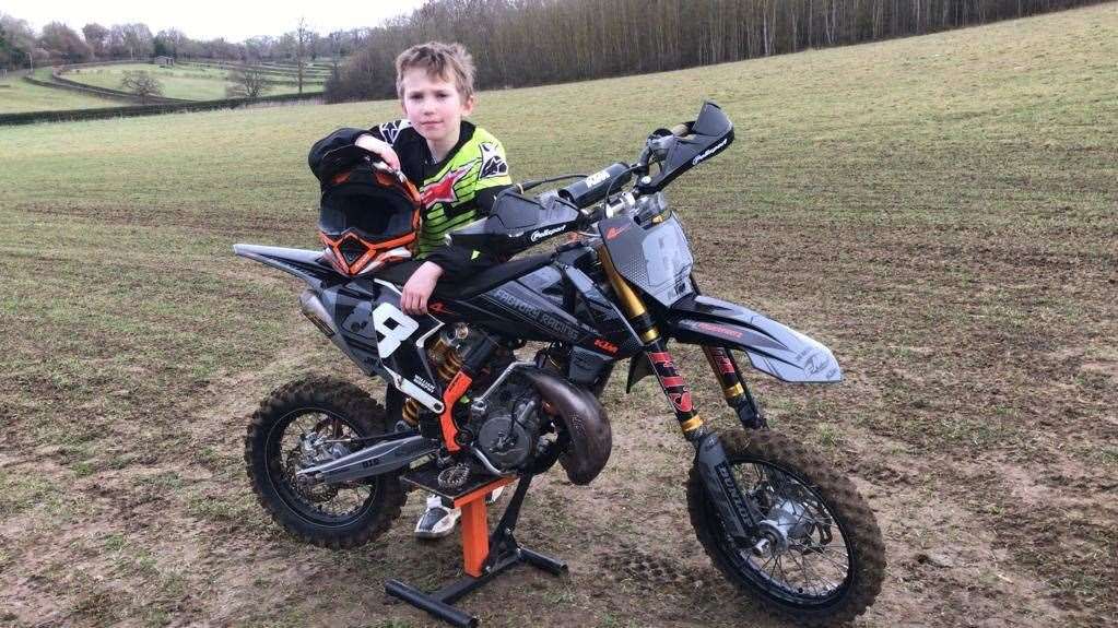 Nine-year-old Christian Davis with his bike which was stolen on Monday