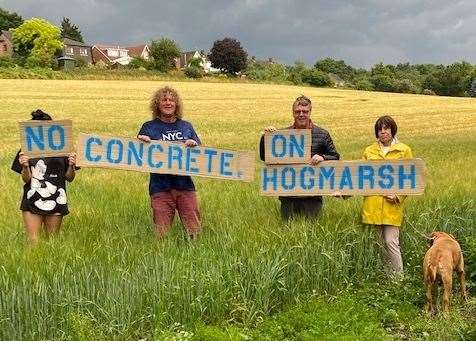 Castle Road resident, Andrew Bates (second from the left), protesting to Keep Upnor Green