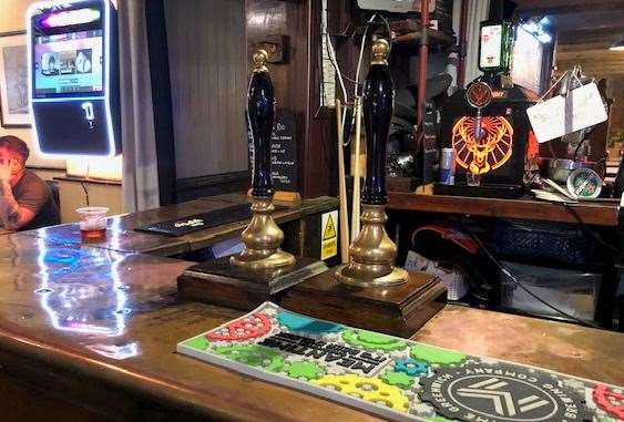 The colourfully-lit drinks dispenser at the back is for creating Jagerbombs - quite a few rounds of this delicacy were served and only one was left on the bar