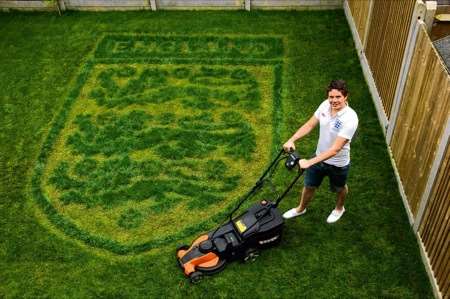 Alex Adams with the England crest on his lawn
