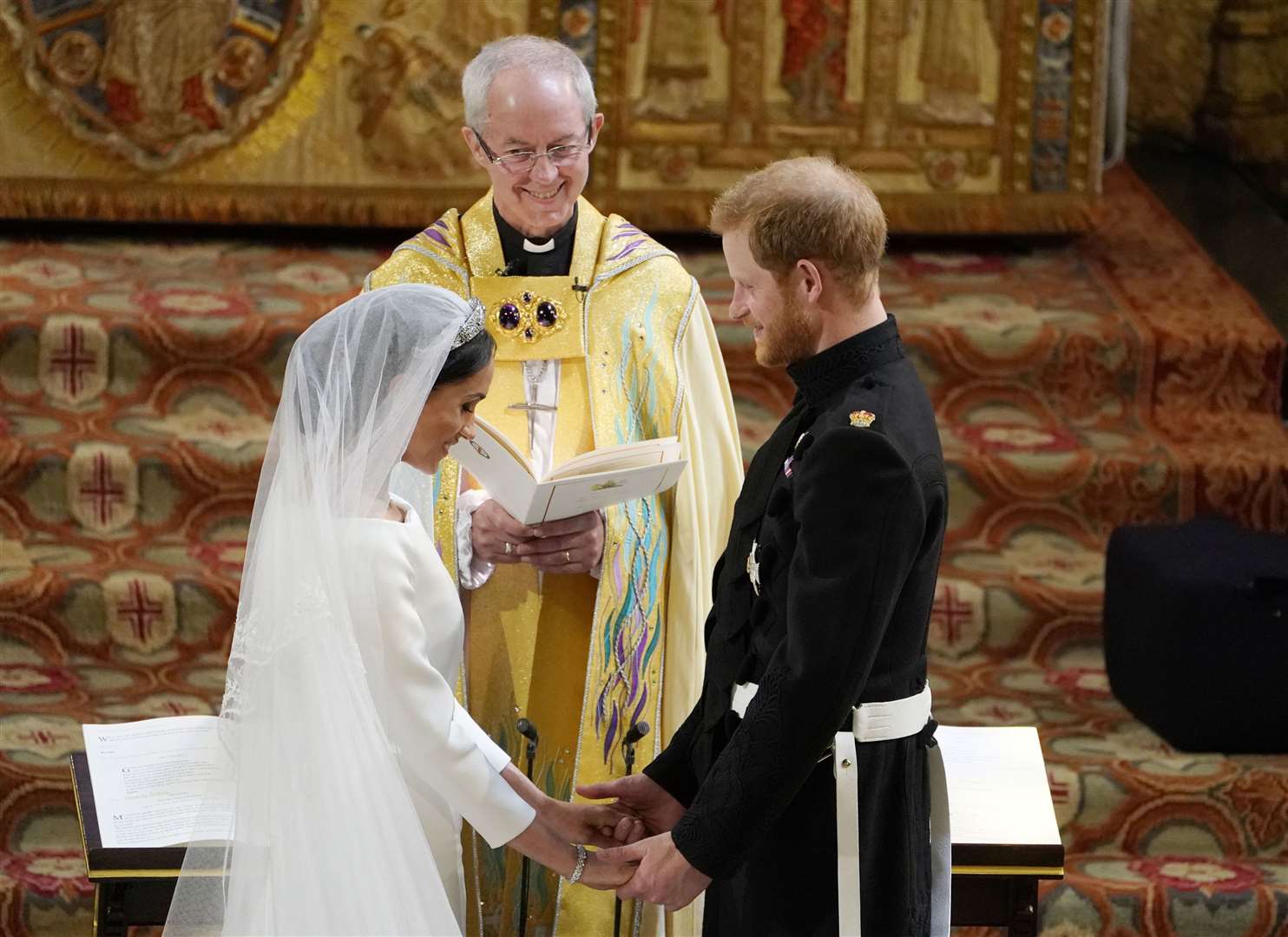 Harry and Meghan exchange vows as Archbishop Welby officiates (Owen Humphreys/PA)