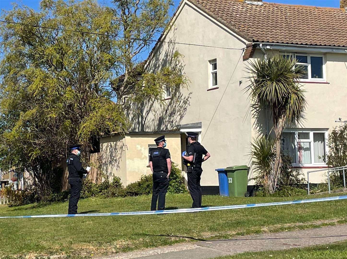 Police outside the house in St John's Avenue, Sittingbourne