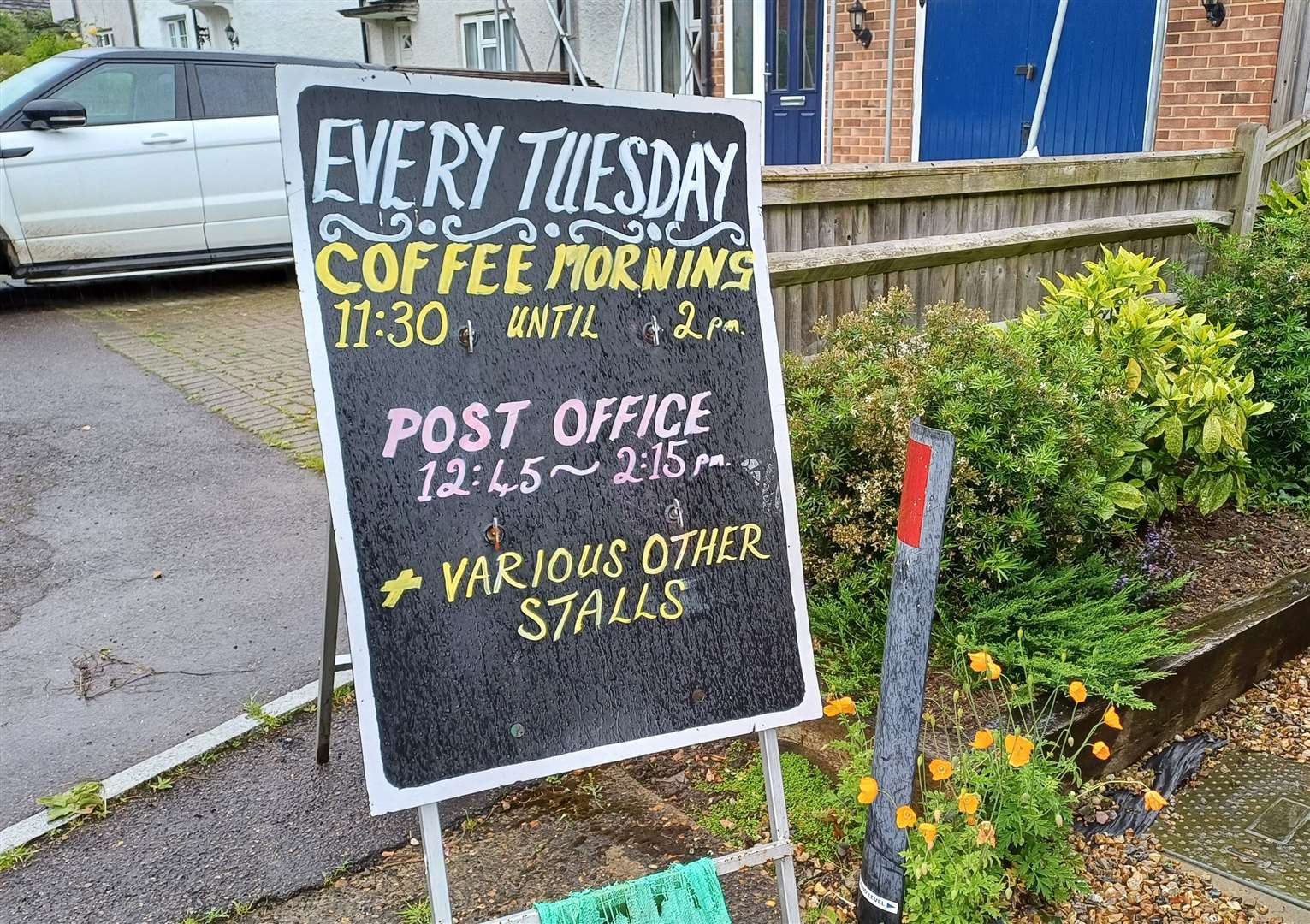 A sign outside Grafty Green village hall about the pop-up post office