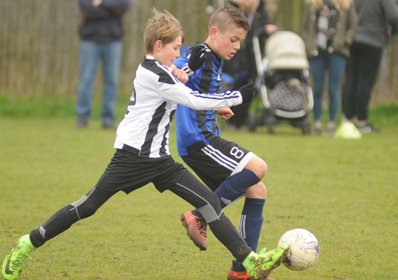 Real 60 Tigers and Woodcoombe Youth under-11s battle it out Picture: Steve Crispe