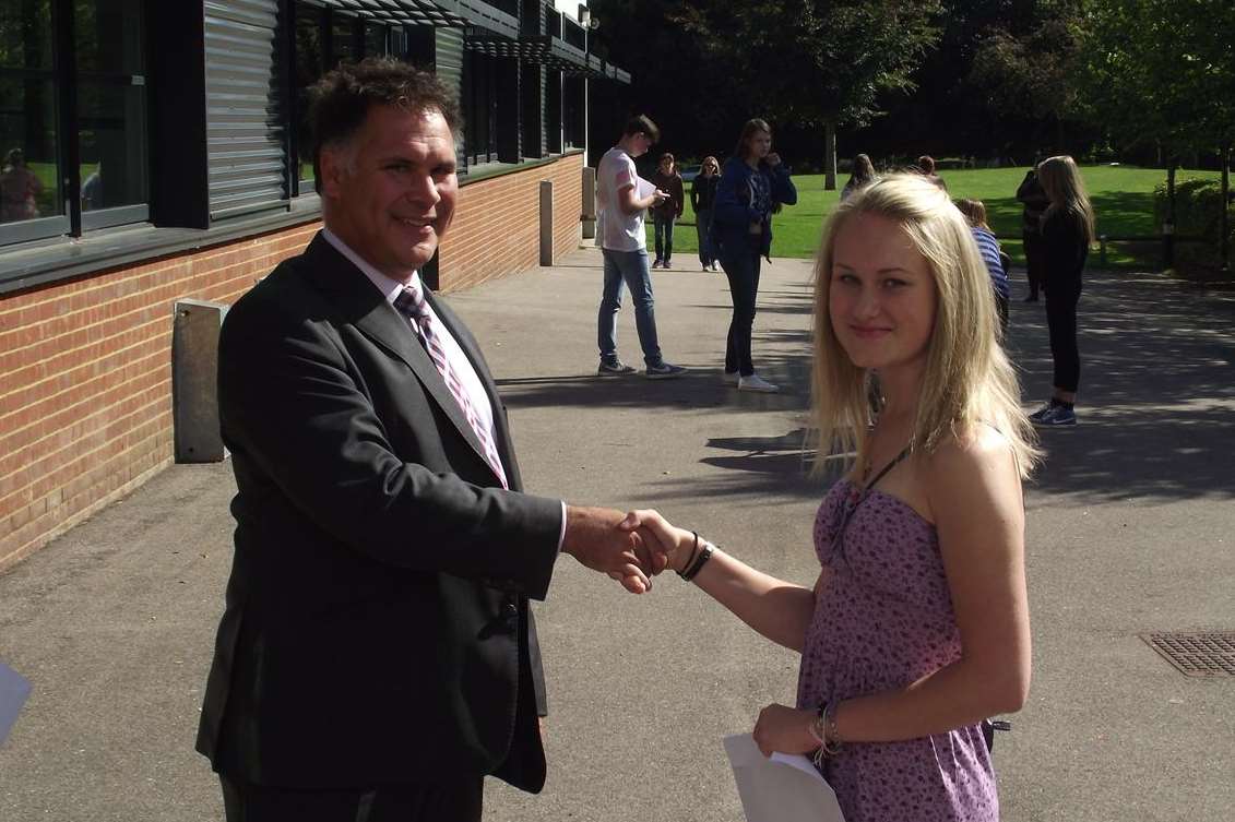 Malling School's headteacher Carl Roberts congratulates Dominka Warecka