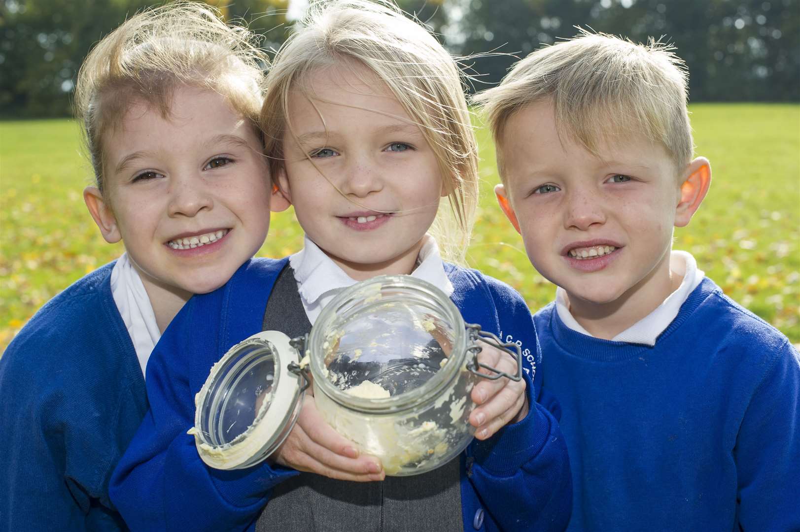 From left, Eva, Siena and Eddie-James, all five, with butter they have made during farming week at Darenth Community Primary School