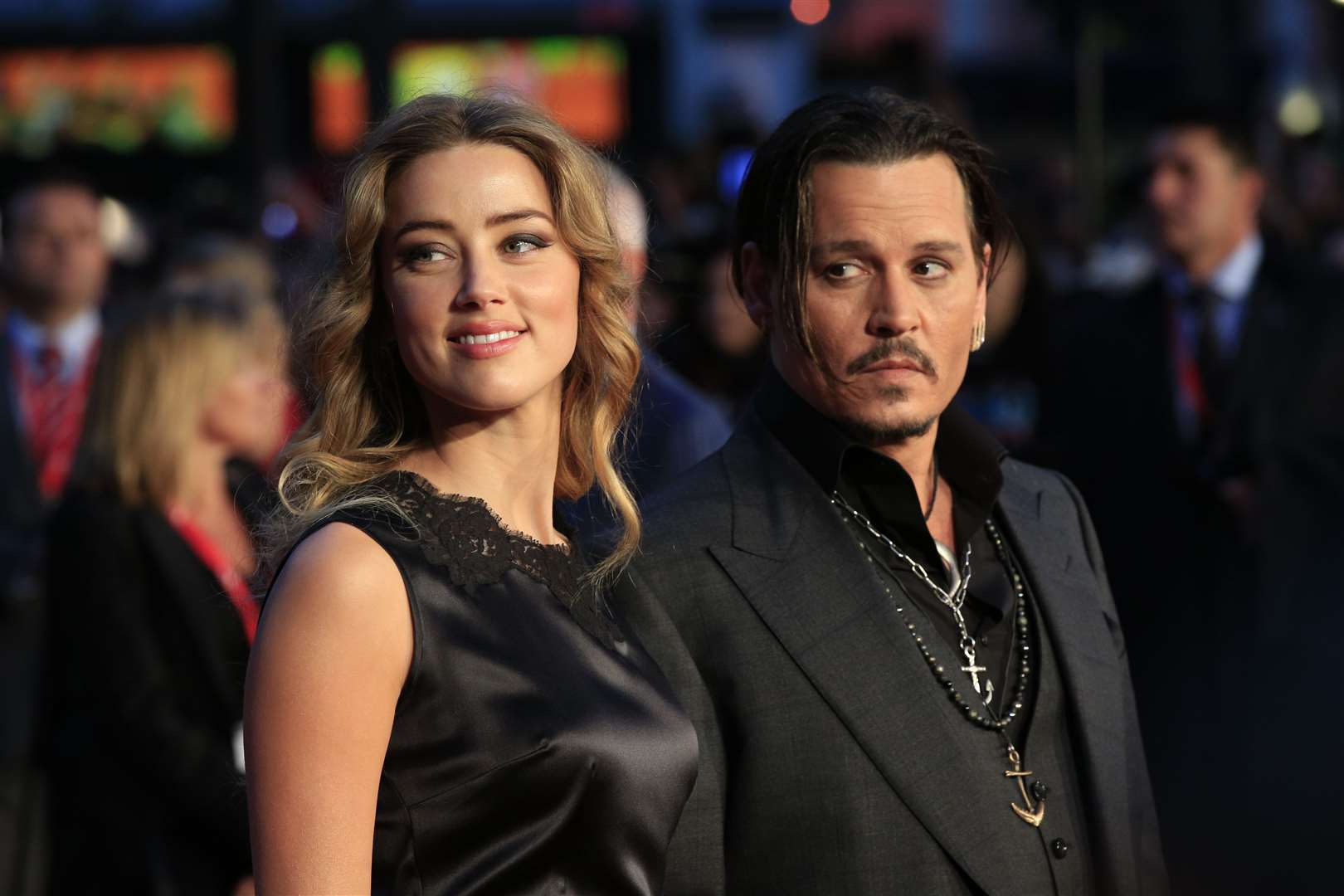 Amber Heard and Johnny Depp attending the premiere of Black Mass during the 59th BFI London Film Festival in 2015 (Jonathan Brady/PA)