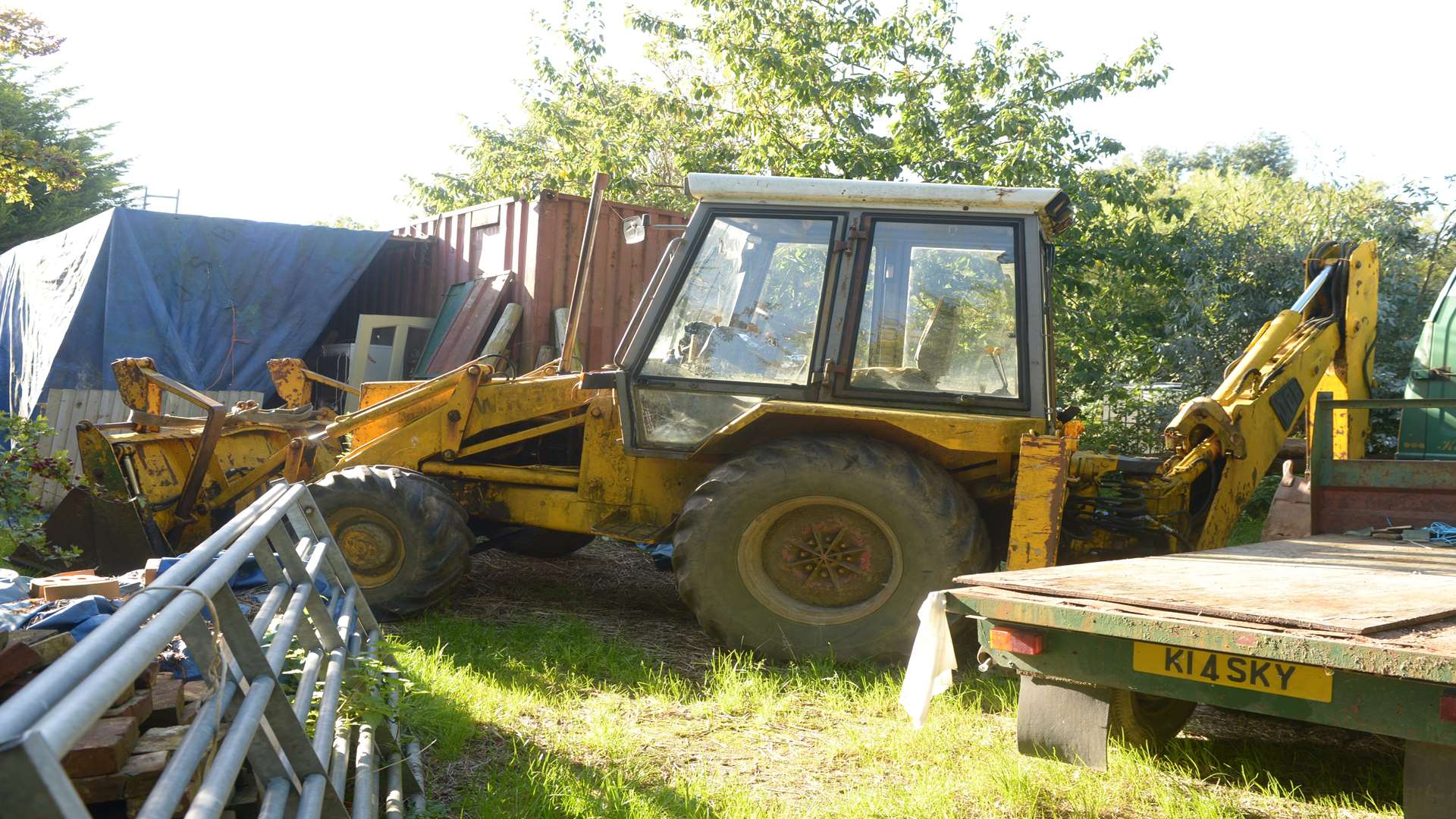 The JCB used to destroy the garden. Picture: SWNS.
