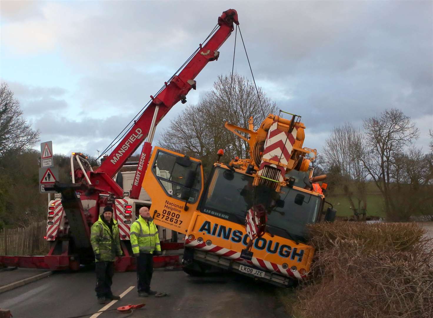 The crane being winched to safety. Picture: UKNIP