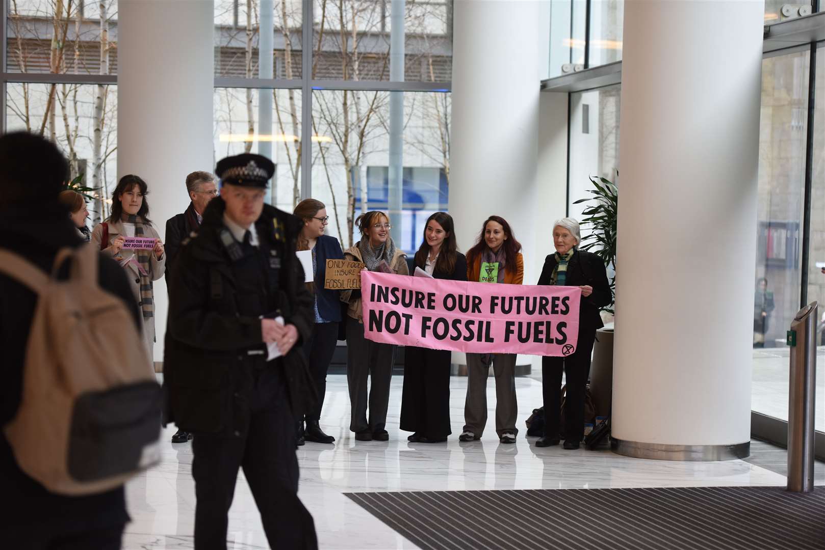 Protesters in the lobby of 20 Fenchurch Street to target insurer Tokio Marine (Gareth Morris/Extinction Rebellion)