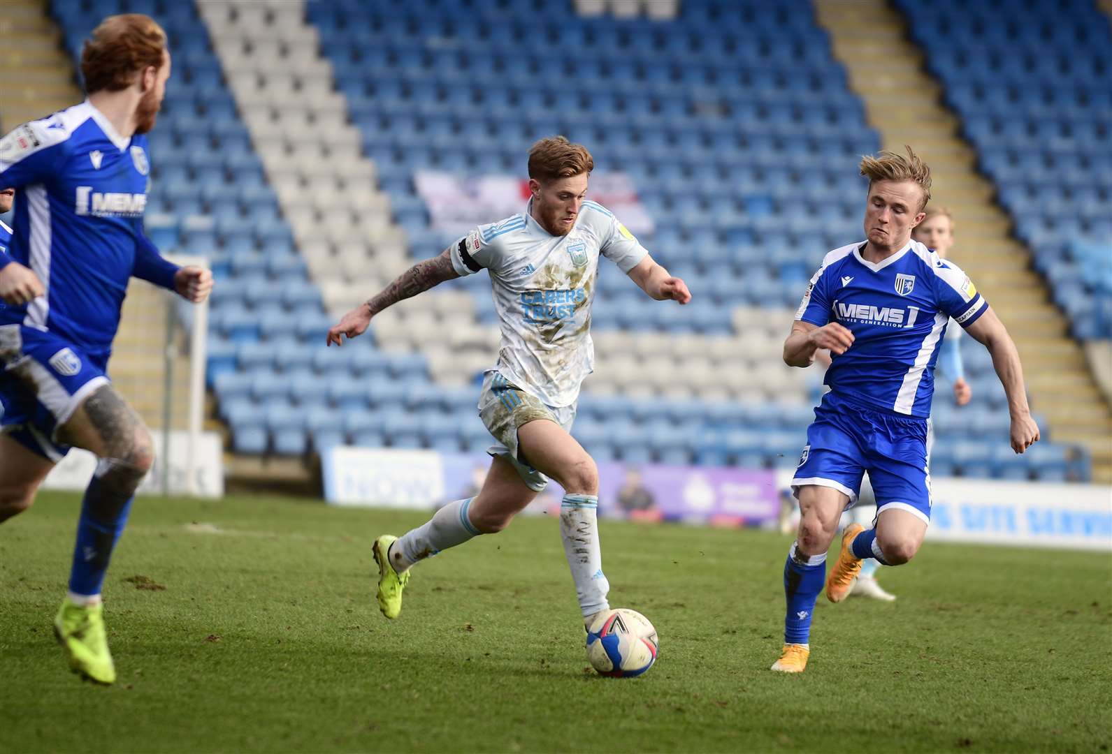 Teddy Bishop pushes forward for Ipswich as Gillingham's Kyle Dempsey closes him down Picture: Barry Goodwin