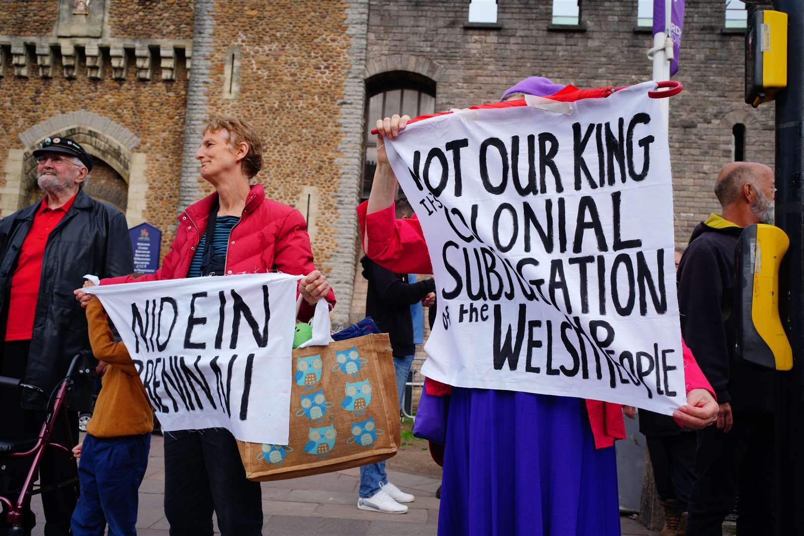 People protest ahead of the ceremony (Ben Birchall/PA)