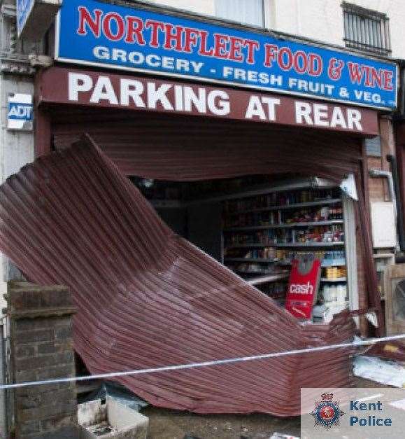 The damaged front of the shop where ram raiders stole an ATM. Picture: Kent Police