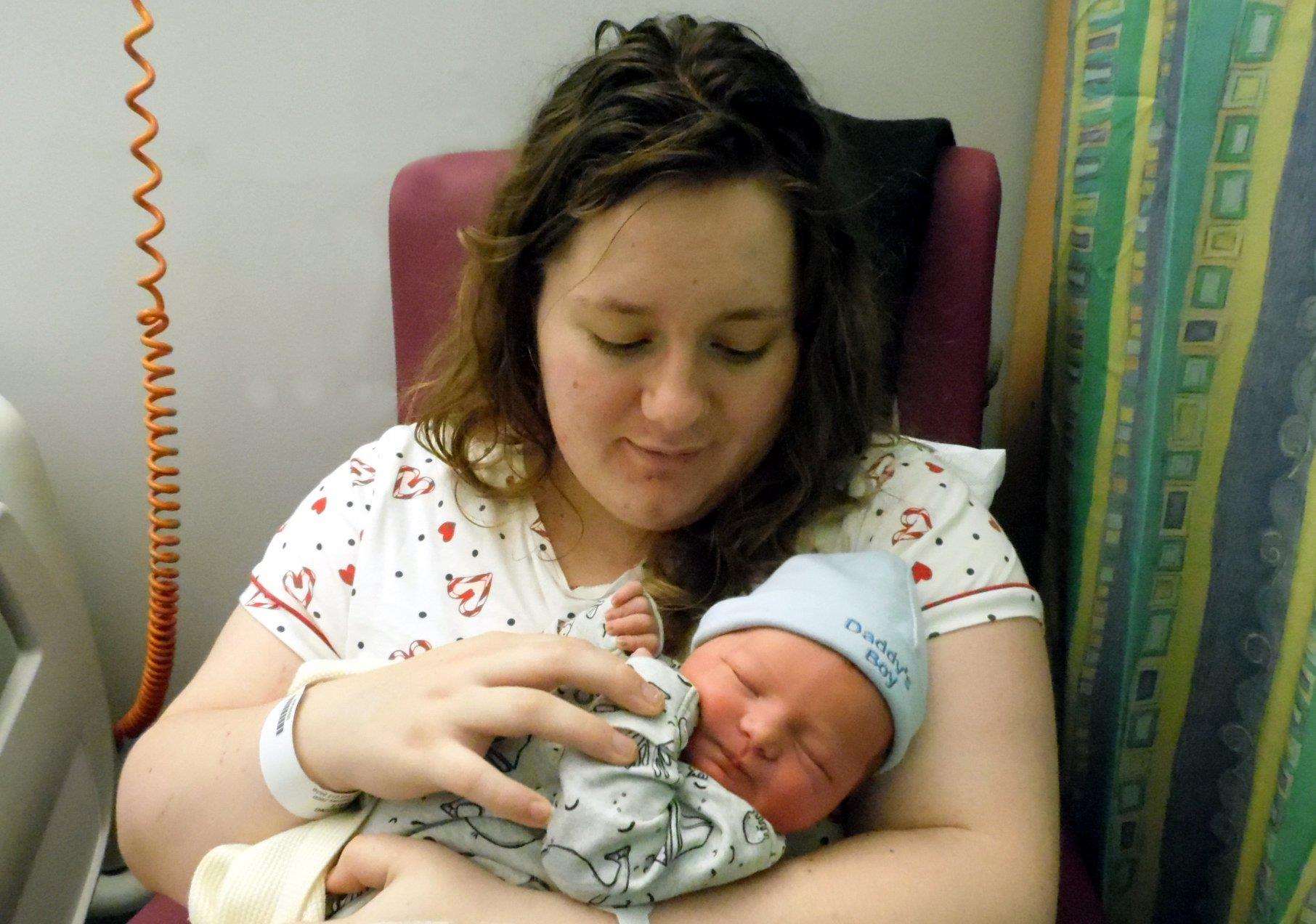 Baby Freddie was born at 16:26 on the 1st Jan weighing 8lb 15oz Feddie is pictured with Mum Grace.  (6314039)