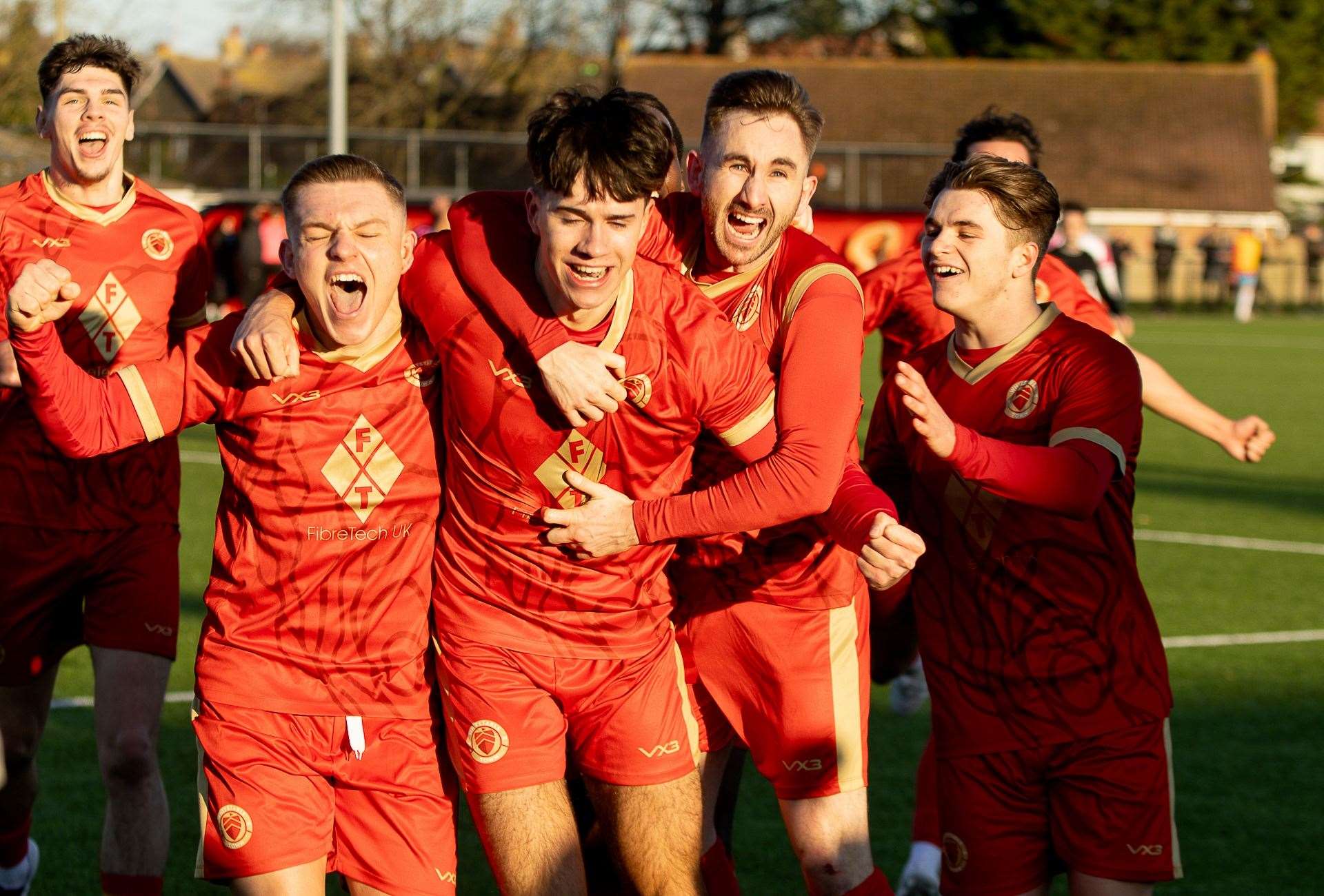 Nico Grierson (centre) celebrates his winning goal for Whitstable against Jersey Bulls in the FA Vase third round on SaturdayPicture: Les Biggs